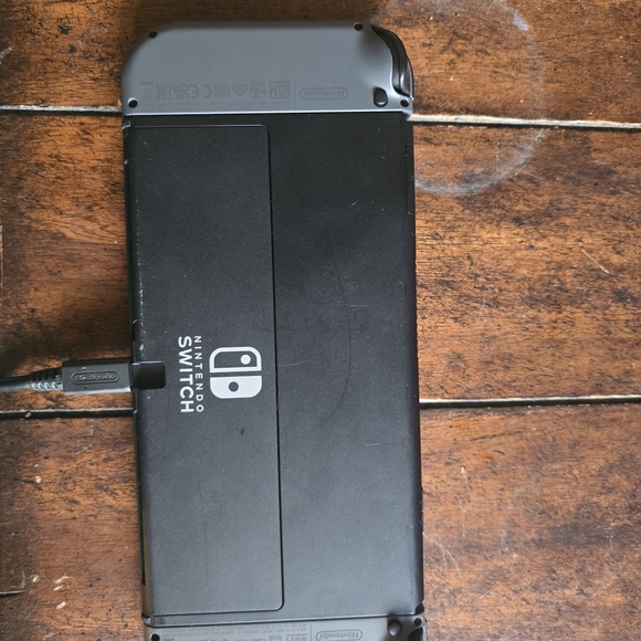 Nintendo Switch Console with Black and Gray Controllers - Picture 3 of 3